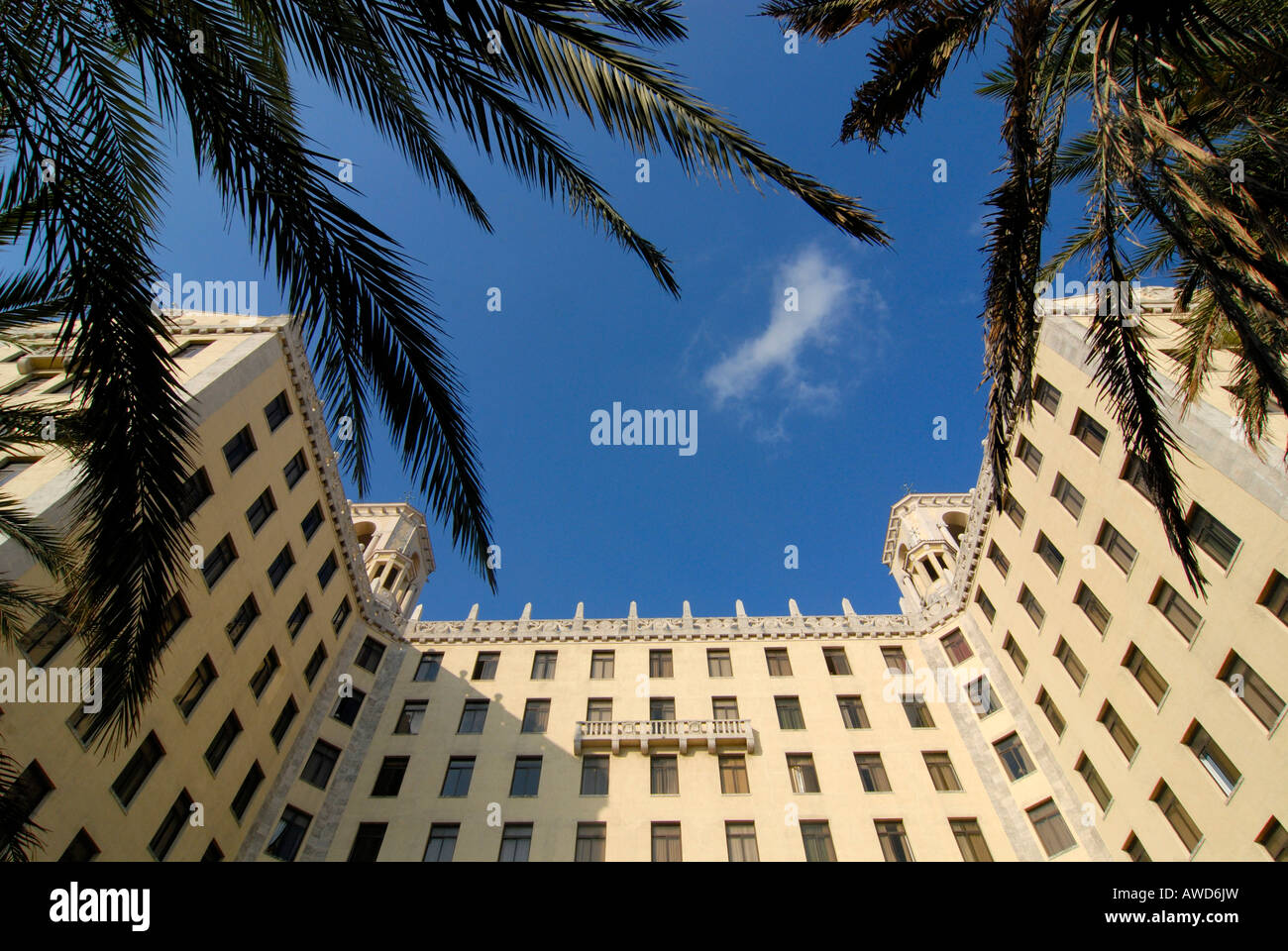 View of Hotel Nacional through palms in Havana, Cuba, Caribbean, Americas Stock Photo