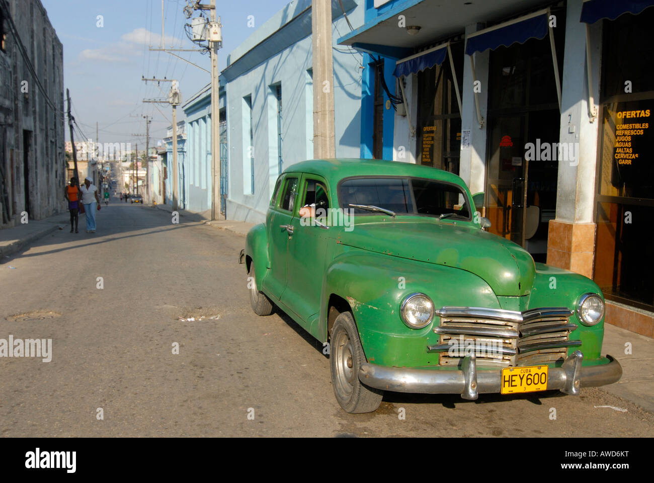 Green vintage car parked on a street in Cienfuegos, Cuba, Caribbean, Americas Stock Photo