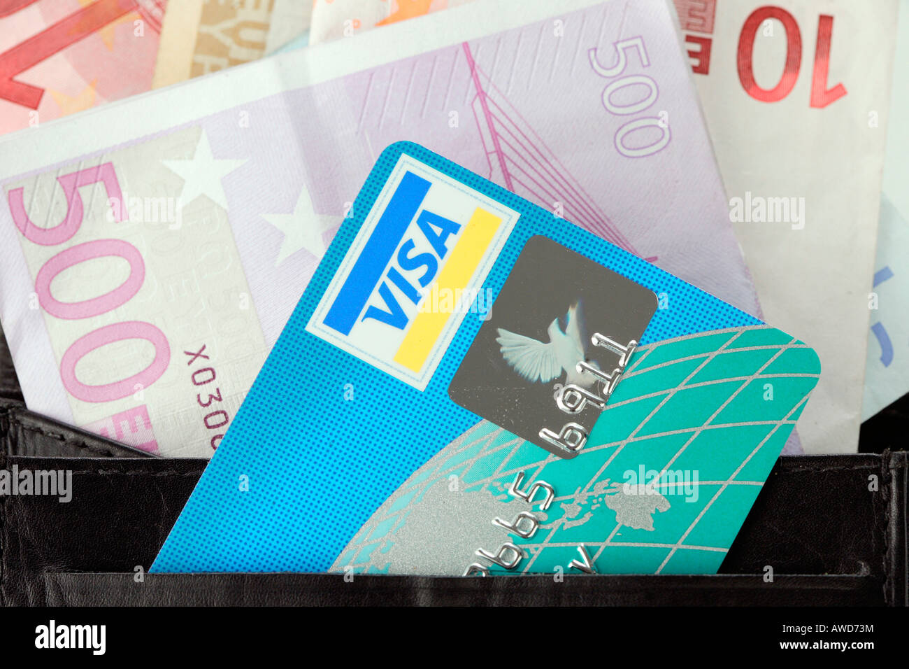 VISA credit card 10 and 500 Euro bank notes in a purse Stock Photo