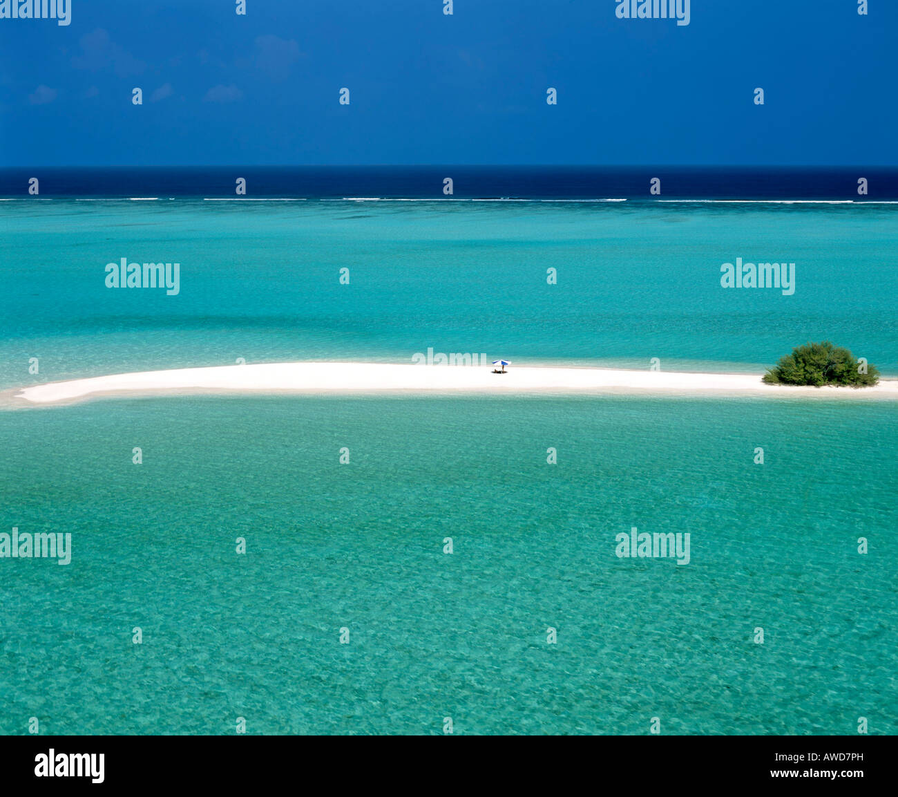 Aerial view of lone sun umbrella on a sand bank, lagoon, turquoise waters, Maldives, Indian Ocean Stock Photo