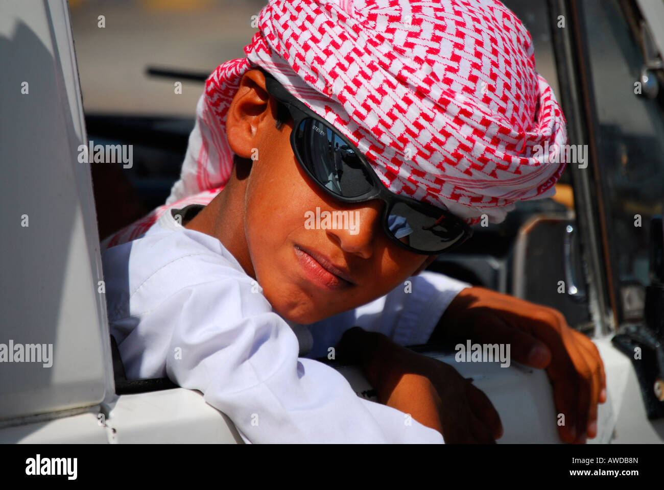 Young man with sunglasses, Ibra, Oman Stock Photo