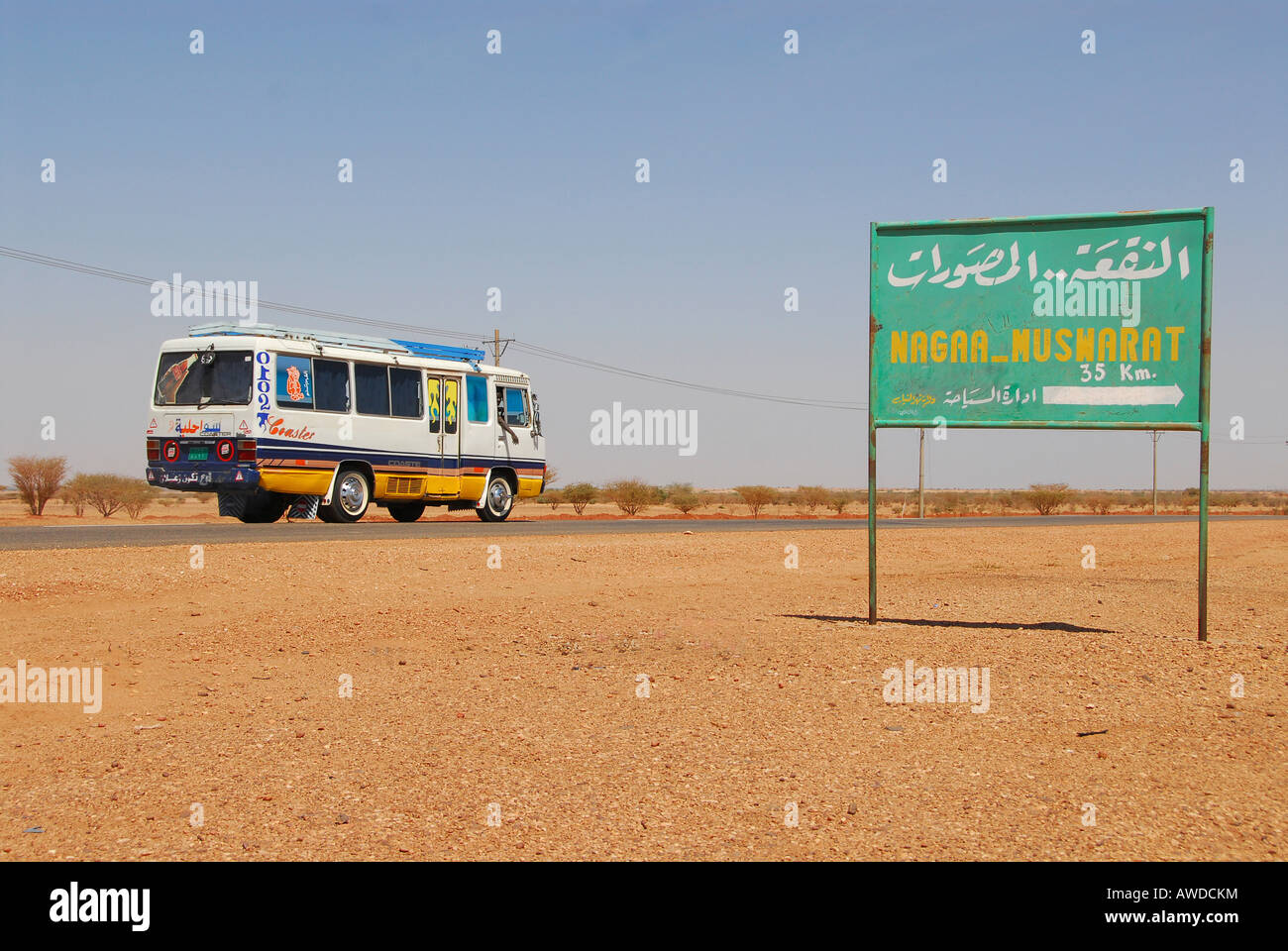 Bus on a country road near Naga, Sudan, Africa Stock Photo