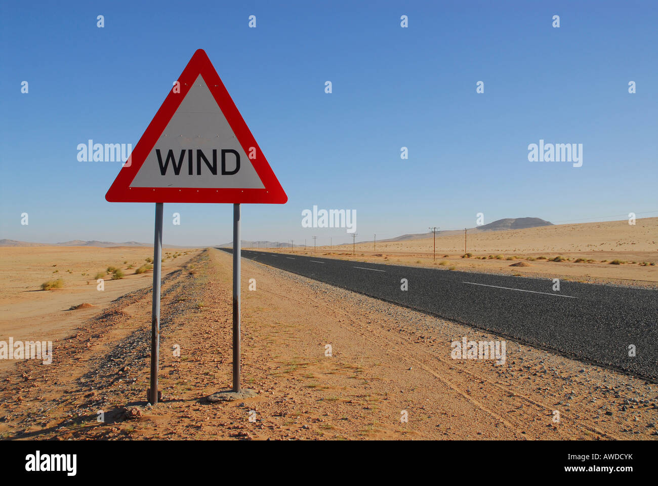 Road sign warning of wind gusts on a highway near Luederitz, Namibia, Africa Stock Photo