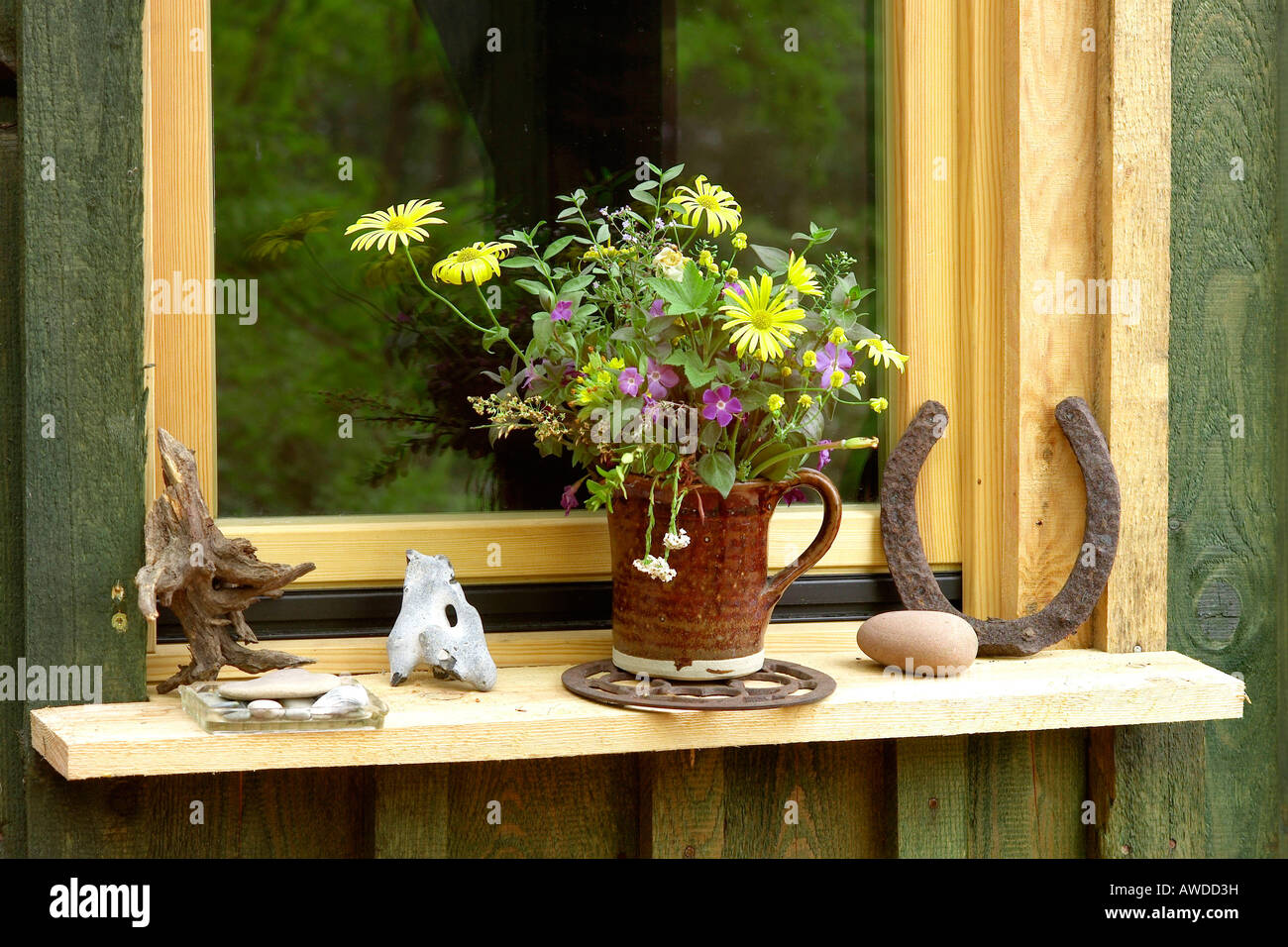 Arrangment on windowsill Stock Photo