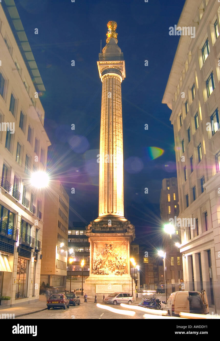 Portrait view of the Monument in central London at night Stock Photo Alamy