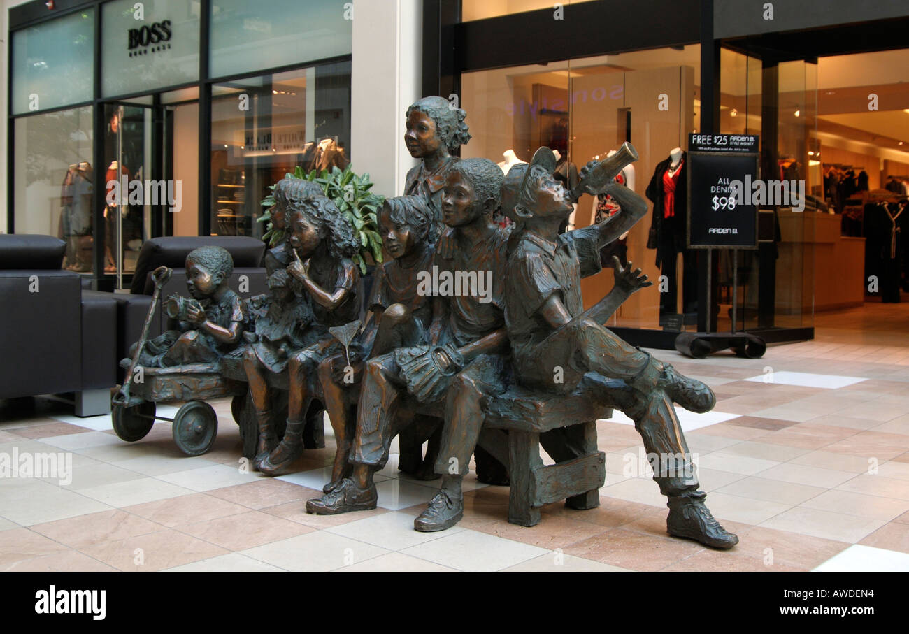 Bronze sculpture of children in a shopping mall White Plains New York USA Stock Photo