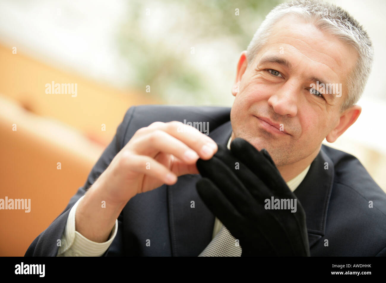 Man wearing glove Stock Photo Alamy