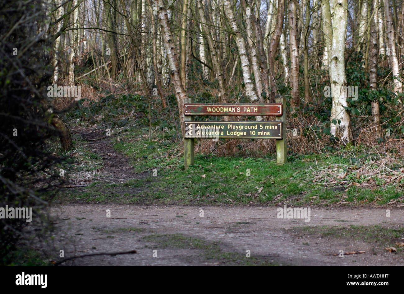 Woodmans Path Signpost indicating the direction and time to walk to many of the facilities and features seen in Bestwood Country Park a community area based on the remnants of the old Bestwood Colliery at one time reputed to be the largest in the UK which closed in 1967. Bestwood Country Park Nottingham, UK Stock Photo