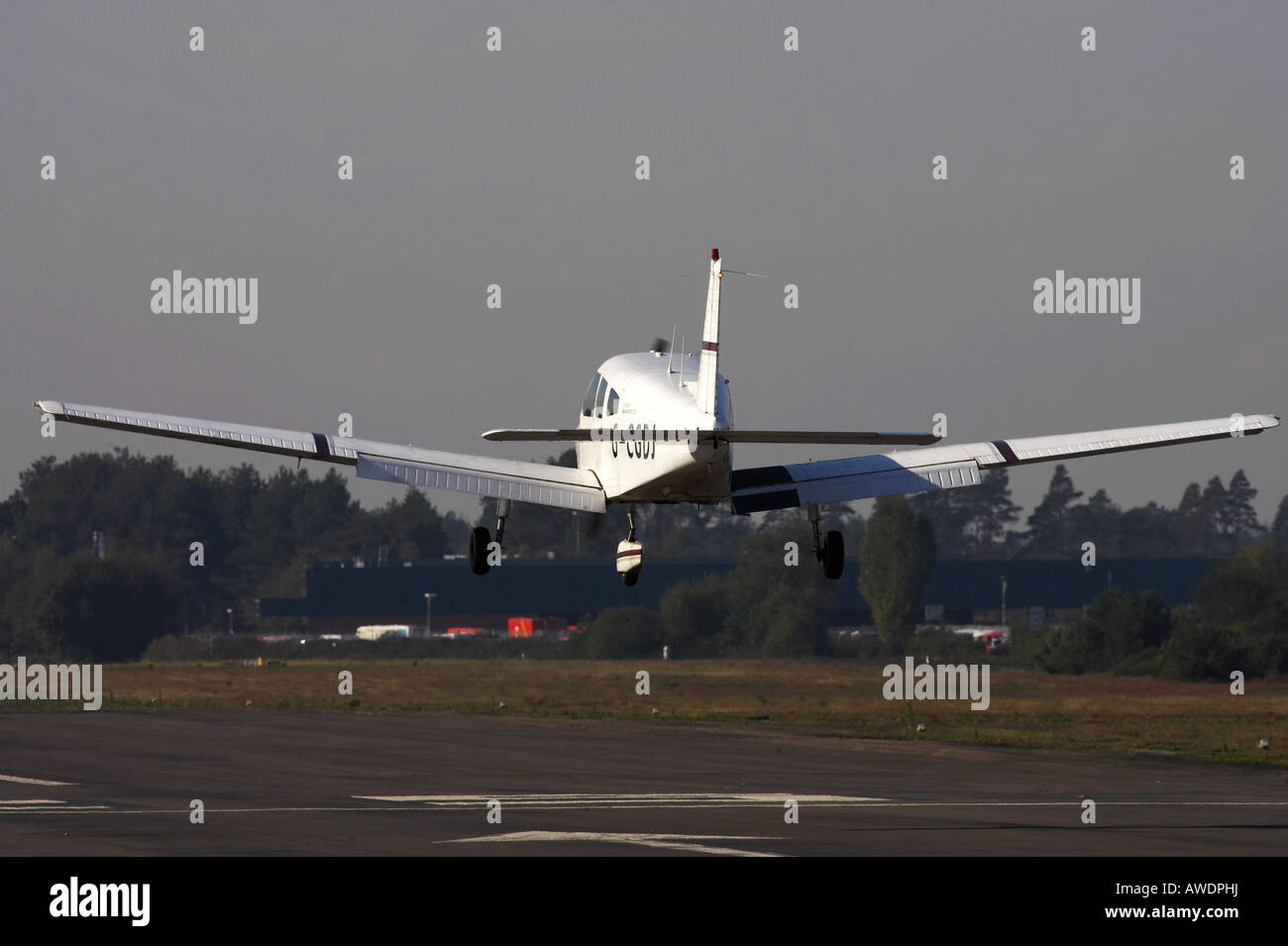 Light aircraft coming in to land Stock Photo - Alamy