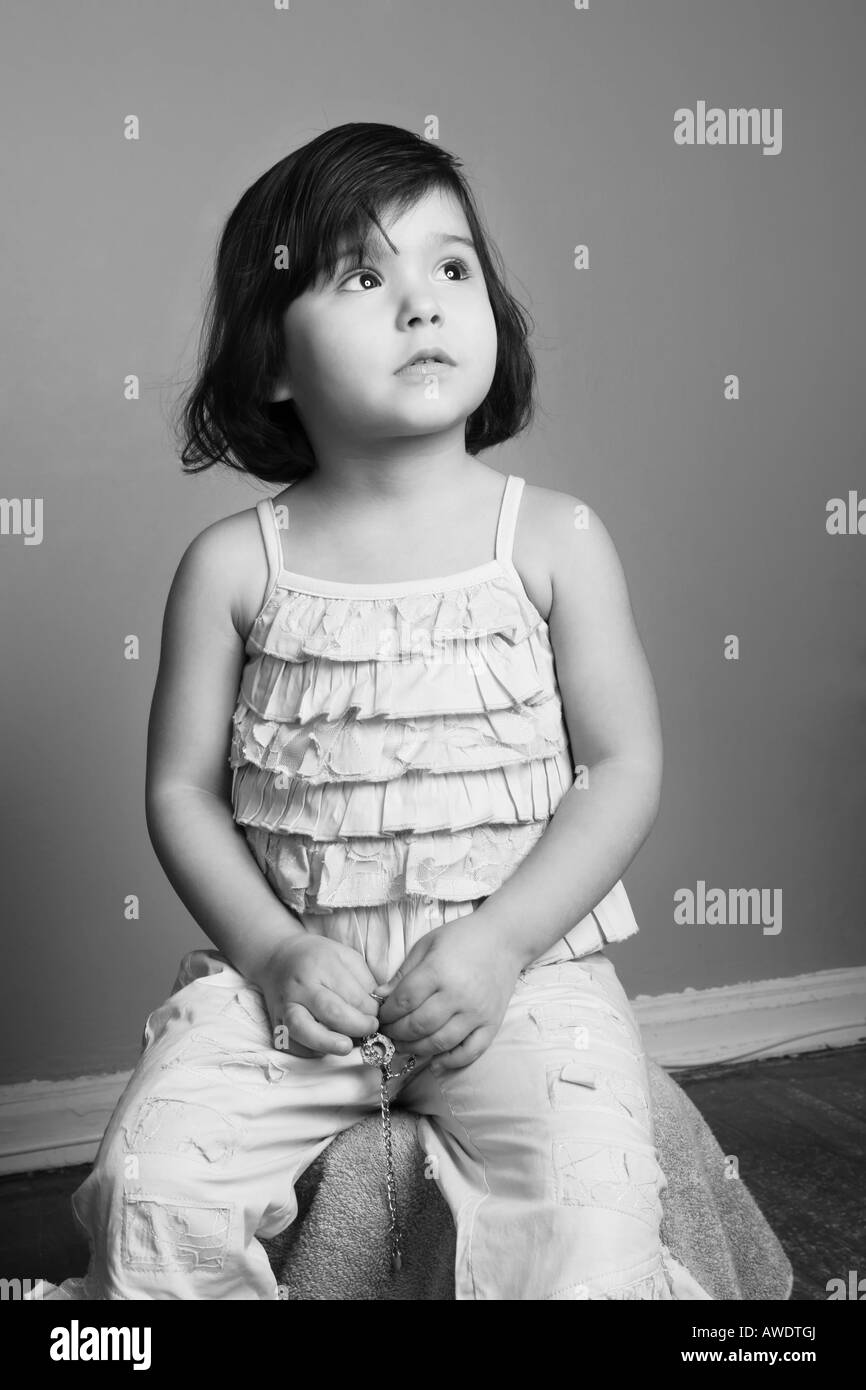 Child 3 Year old girl dreaming. Black and white. Model Released Studio