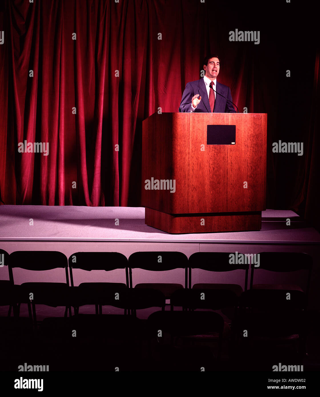 1 one male business executive behind speakers podium copy space Stock Photo
