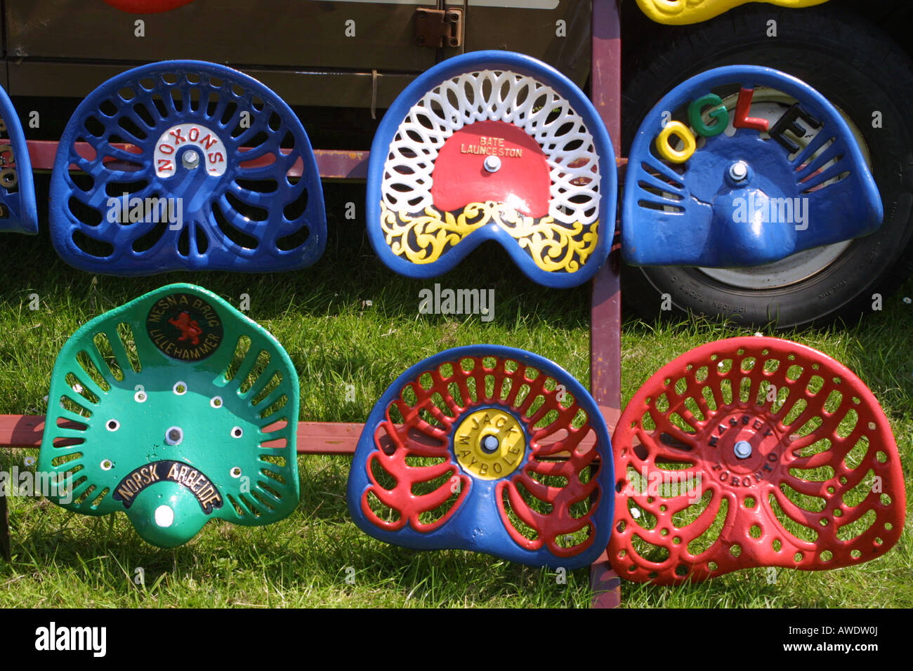 Vintage tractor seat colourful Stock Photo Alamy