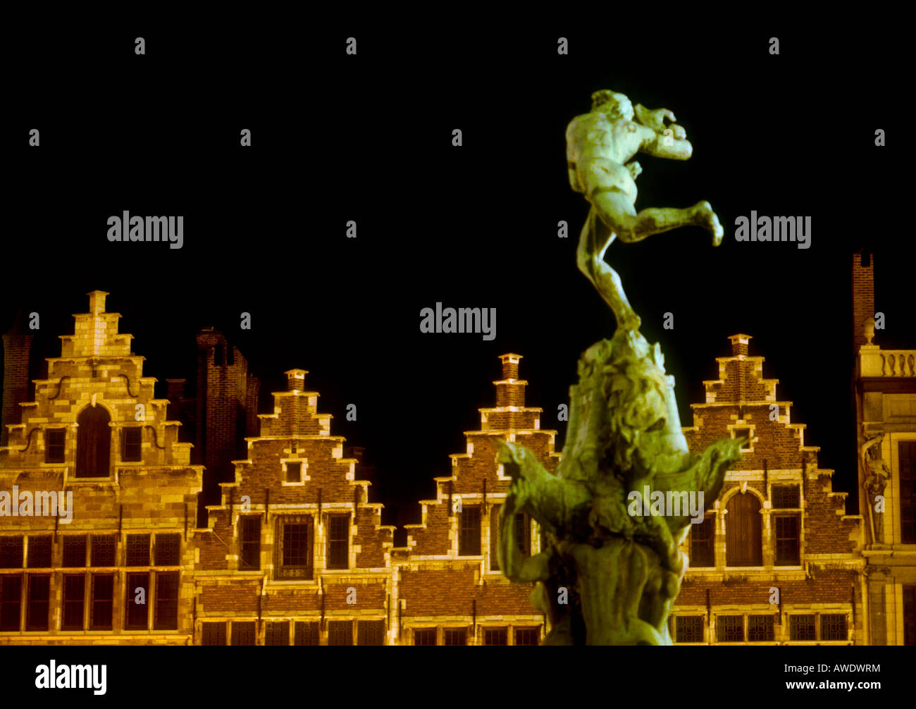 Large statue of man throwing a giants hand local mythology in Grand