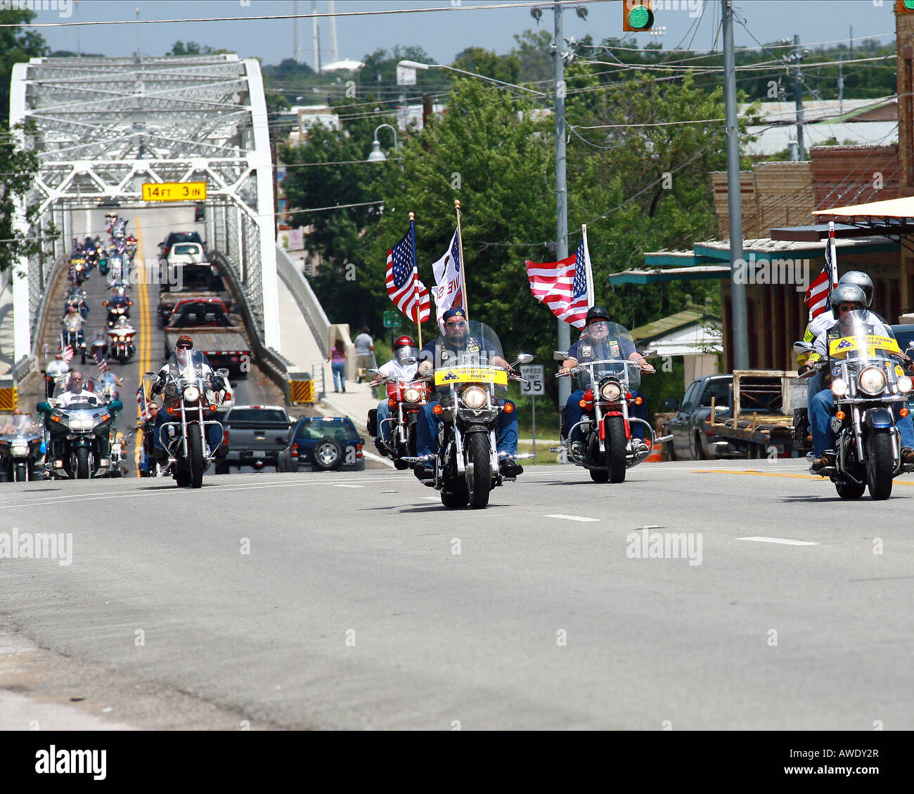 Texas Patriotic Guard Riders ride through Llano Texas in route to a memorial service for Army Major Thomas Bostick. Stock Photo
