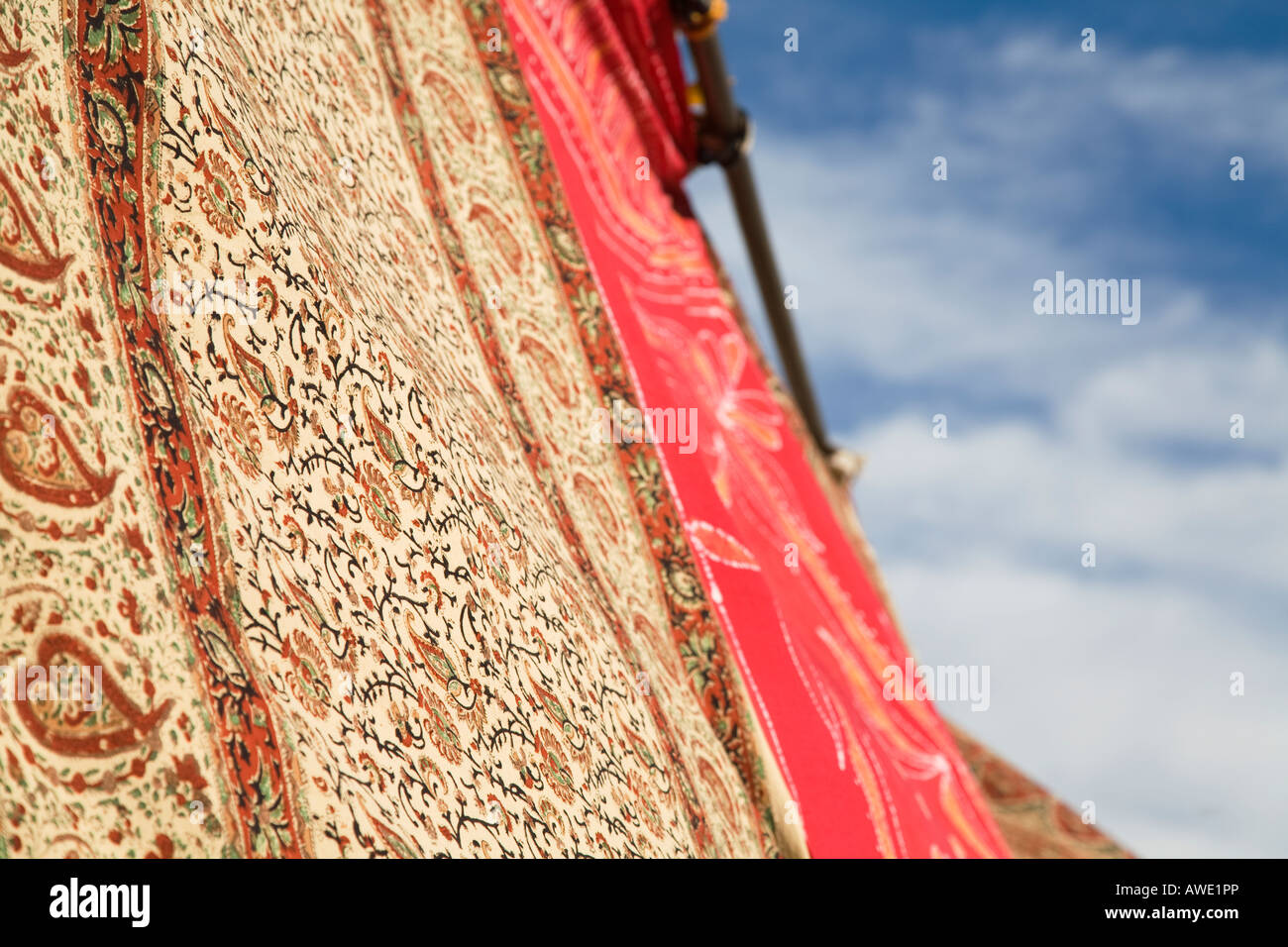 CALIFORNIA Santa Barbara Colorful patterns and designs on Indian fabrics displayed outdoors Stock Photo