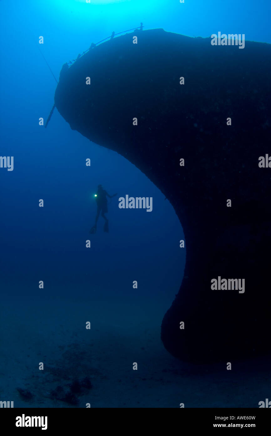 Diver exploring the wreck of the Sea Tiger off Waikiki, Oahu, Hawaii. Stock Photo