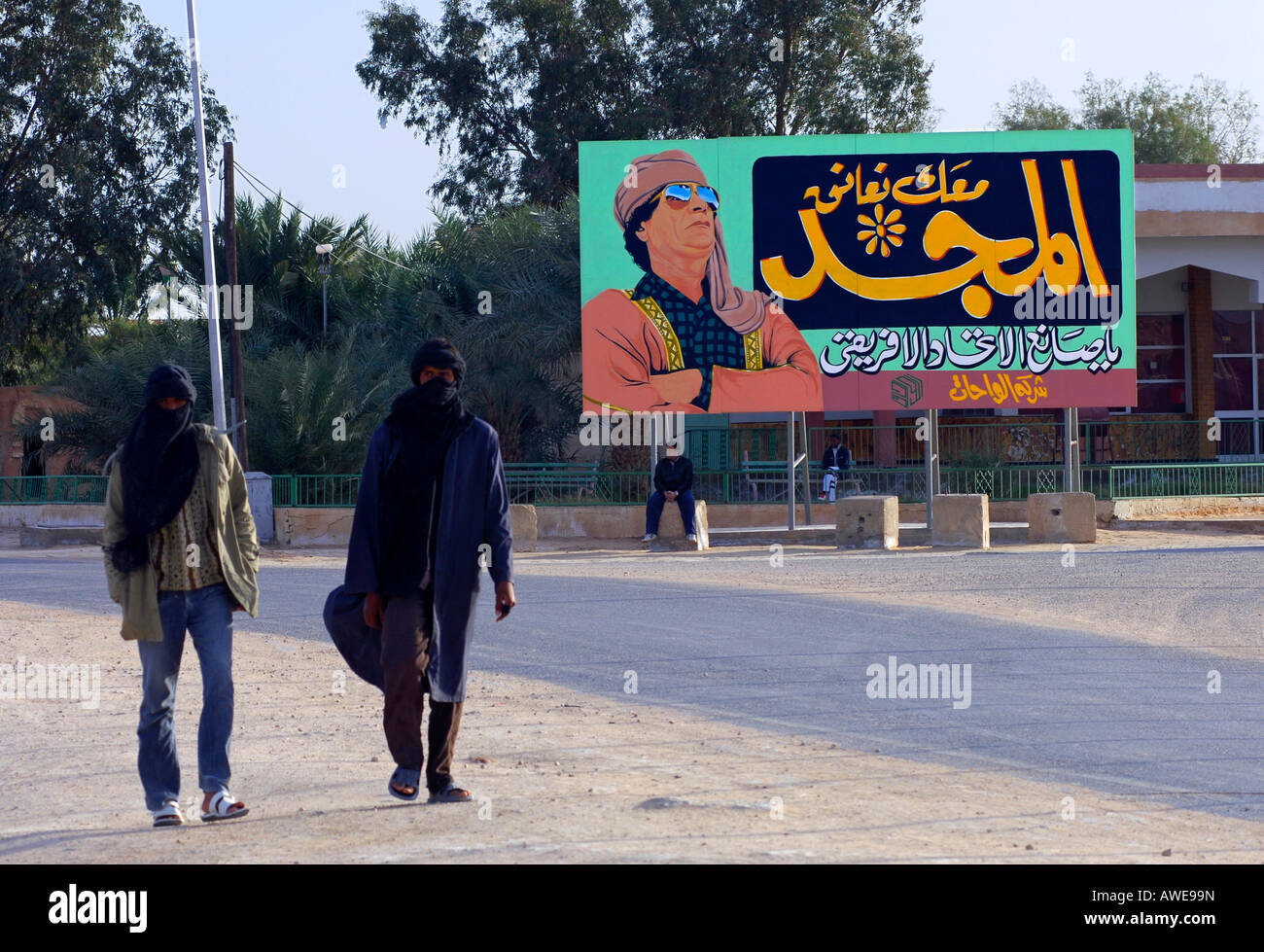 Poster with image of Mouammar Kadhafi and slogan "With you to the glory, founder of the African Union", town of Darj Libya Stock Photo