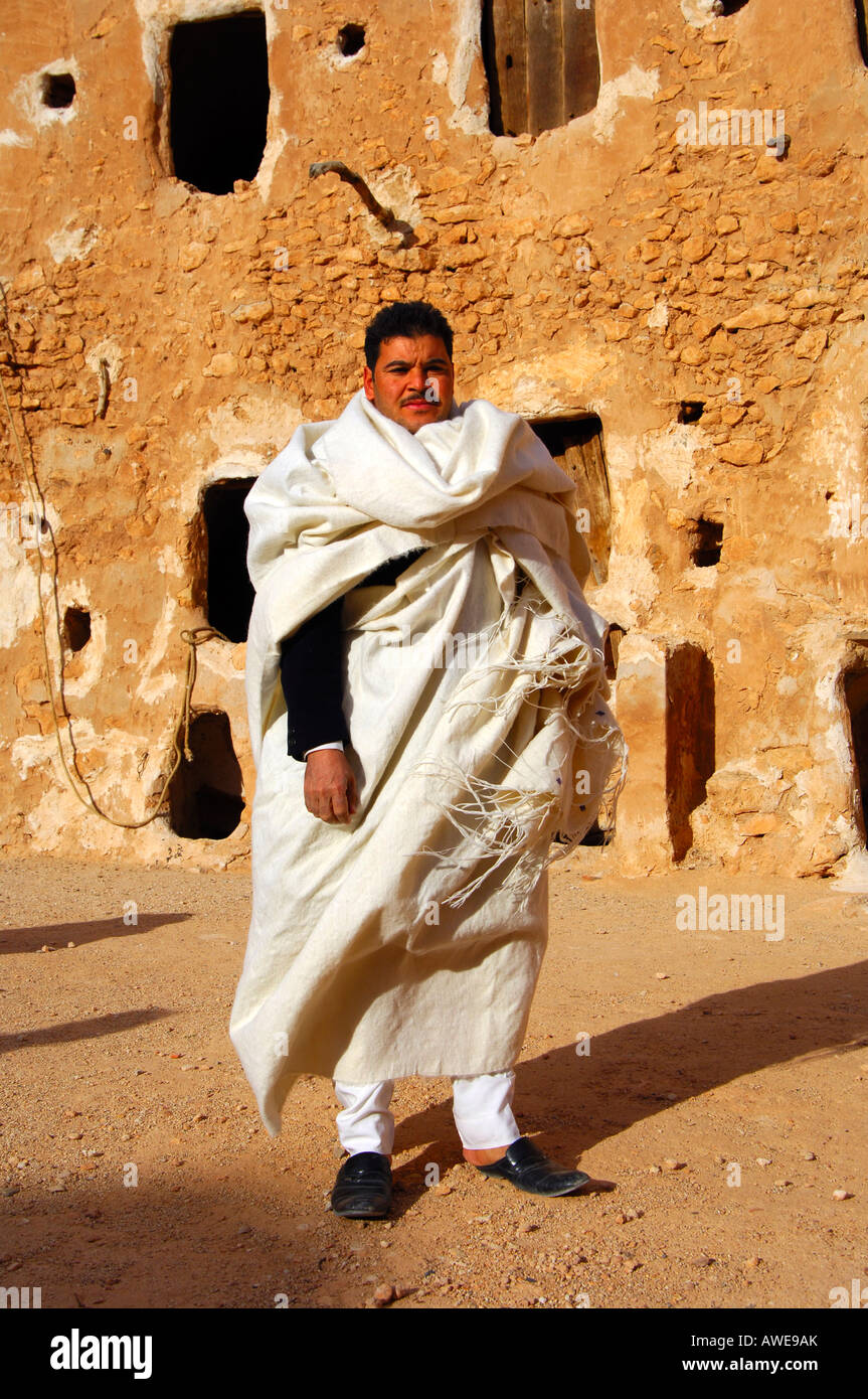 Man in traditional Berber dress in the Berber granary Qasr-al-Hadj Libya Stock Photo