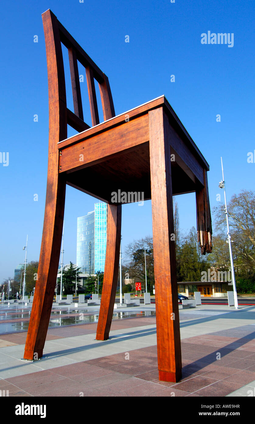 Broken chair by Daniel Berset, commissioned by Handicap International urging governments to sign Mine Ban Treaty, Place des Nat Stock Photo