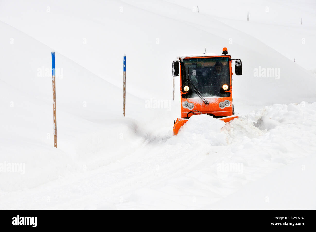 Winter road clearance in Kleinwalsertal, Austria, Europe Stock Photo