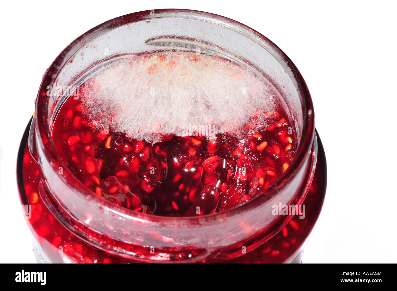 Glass with mouldy jam Stock Photo