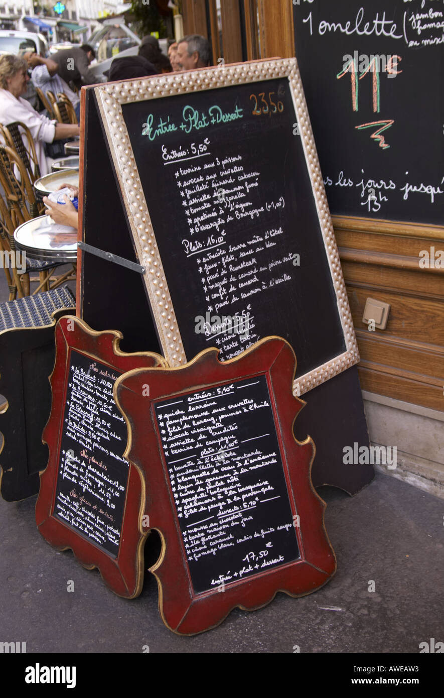 blackboard menus at a cafe on Rue Abbesses Montmartre Paris Stock Photo