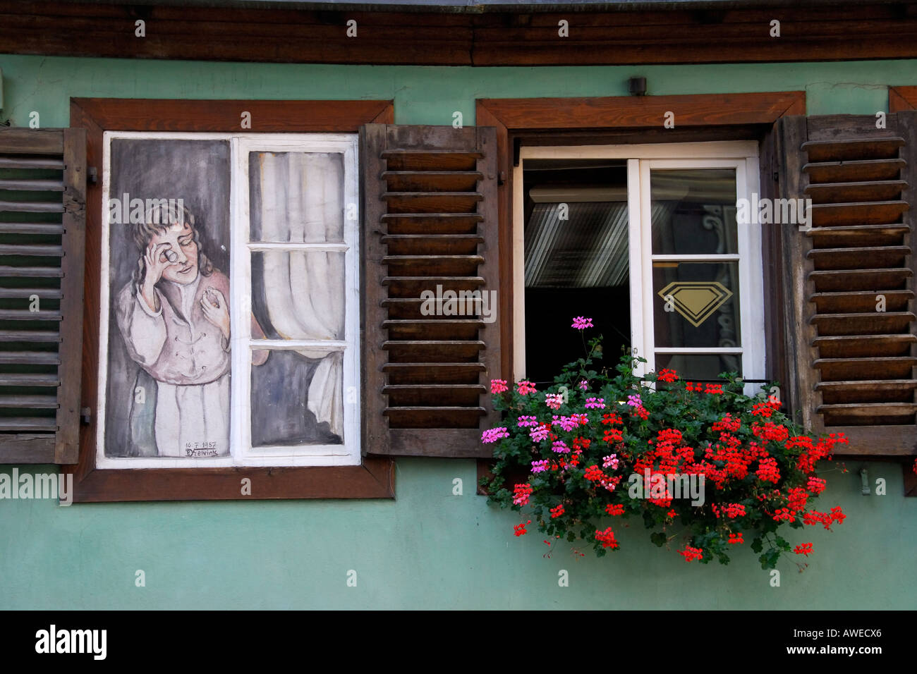 'Trompe l'oeil, woman at a window, Alsace' Stock Photo