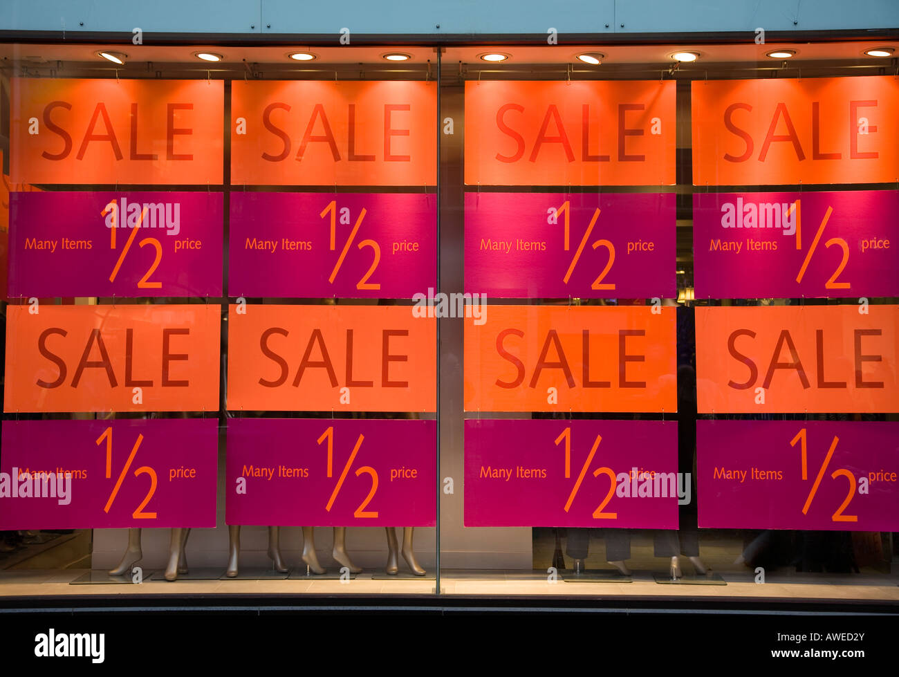 shop window display with sale signs, Glasgow, Scotland Stock Photo