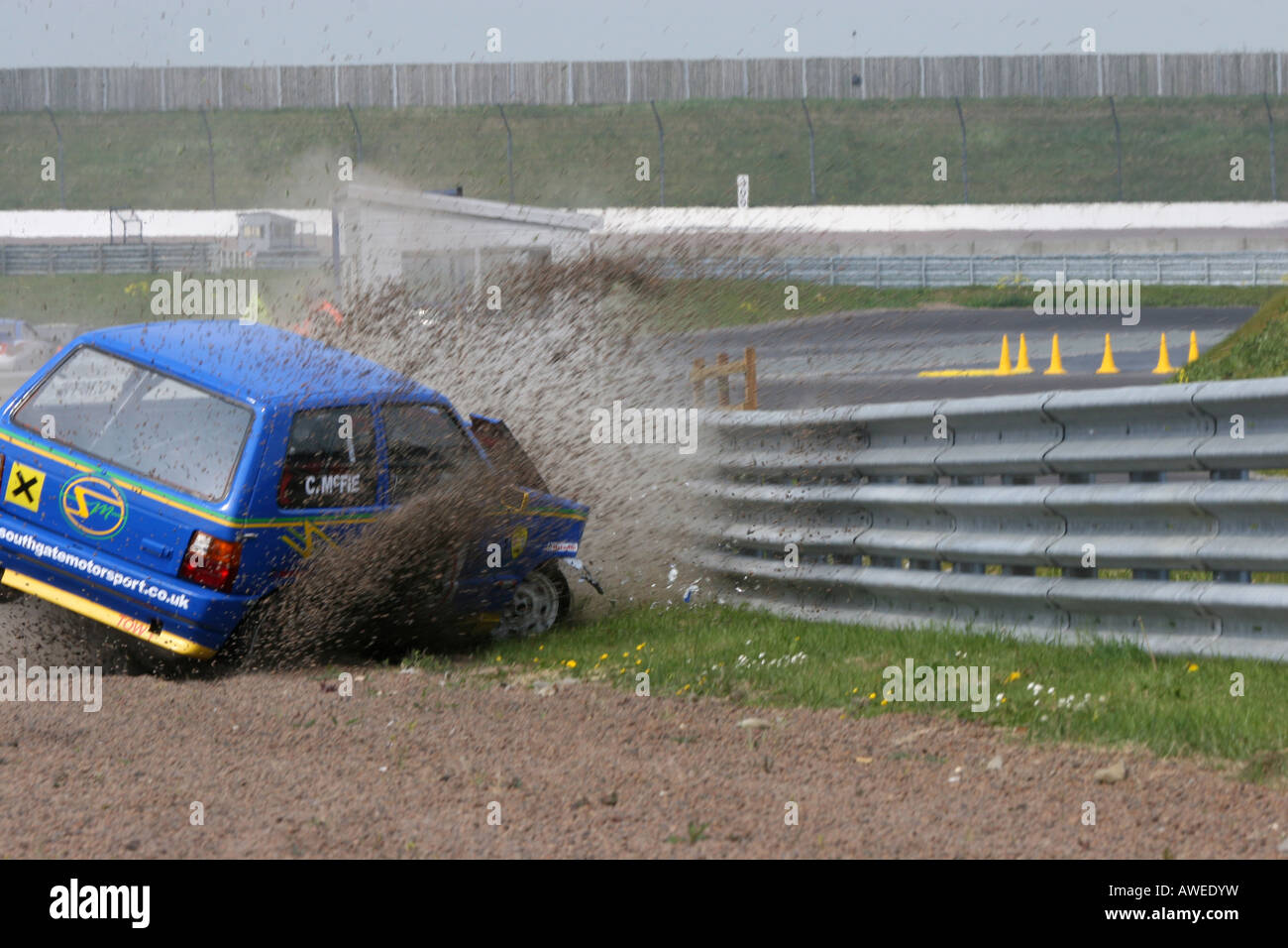 Racing Fiat Uno crashing into the barrier Stock Photo