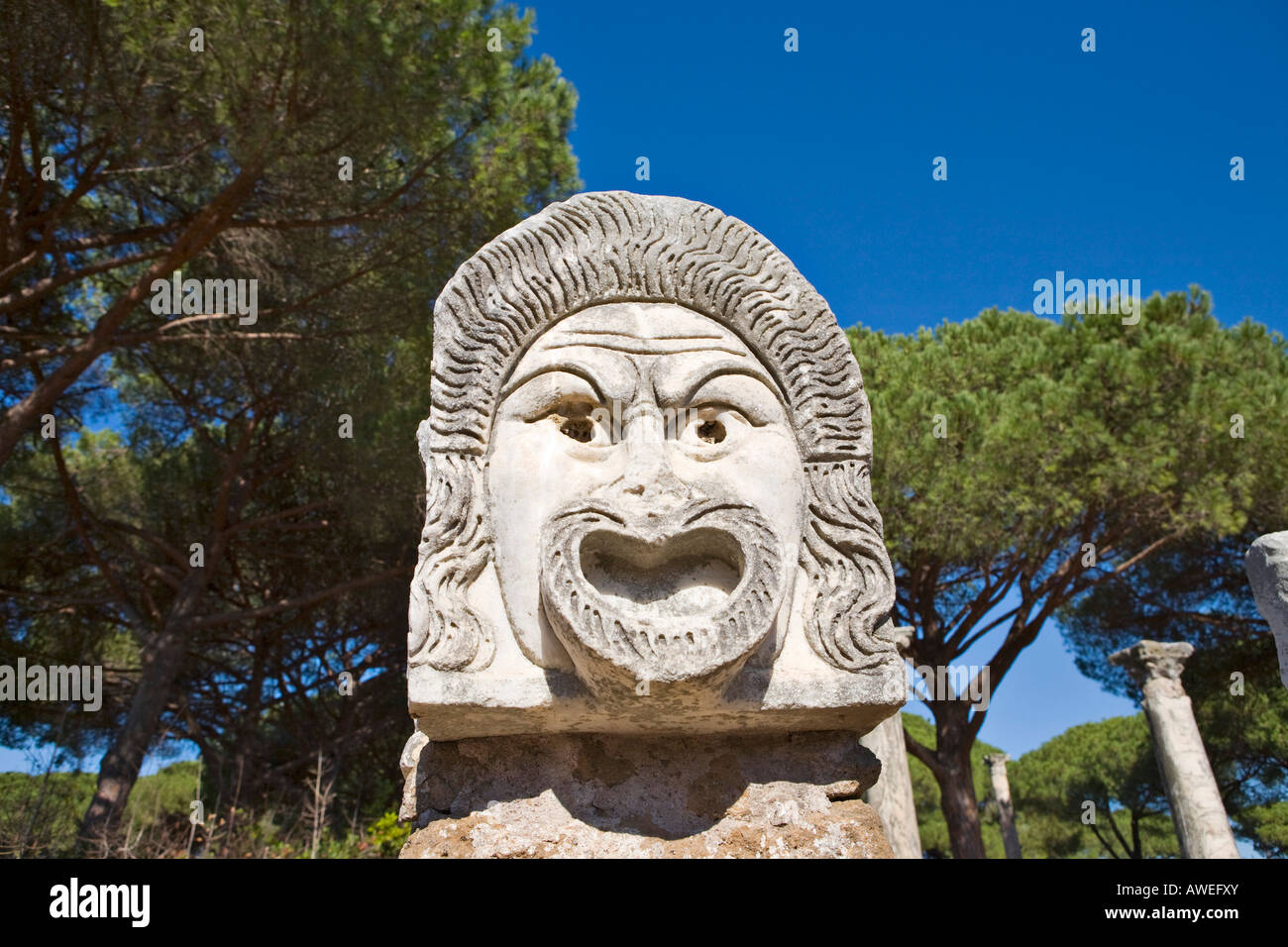 Comical masks at the amphitheatre at Ostia Antica archaeological site, Rome, Italy, Europe Stock Photo