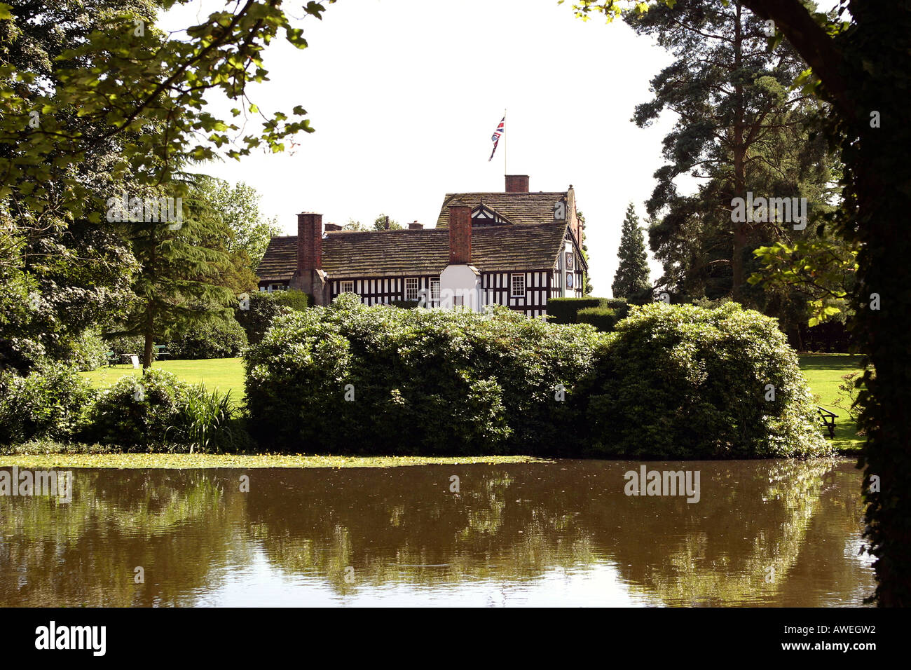 England Cheshire Gawsworth Old Hall across the lake Stock Photo Alamy