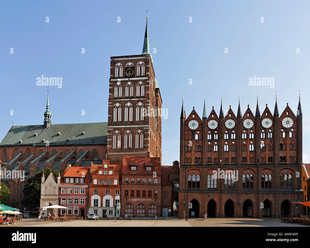 Gothic town hall and St. Nicholas Church at the Old Market in Stralsund ...