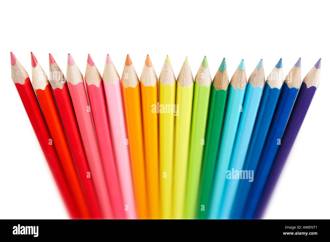 STANDING ROW OF COLOURED PENCILS Stock Photo