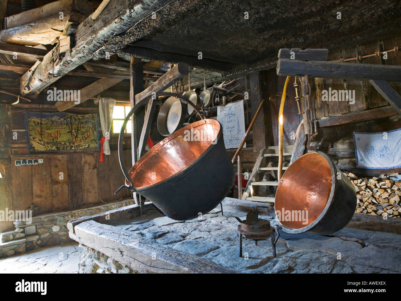 Copper kettles in a rustic kitchen, Weissalm alpine pasture, Grossarltal, Salzburg, Austria, Europe Stock Photo