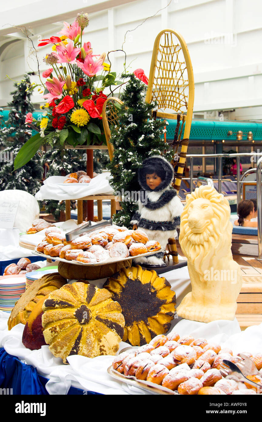 Attractive food displayed with Alaskan decor on deck of the Holland America cruise ship Zuiderdam Stock Photo