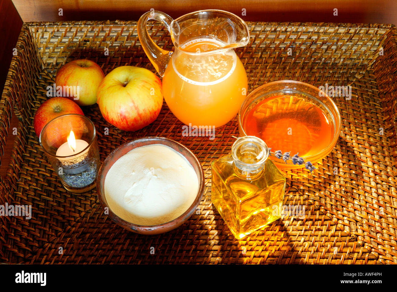 Apples, fruit juice, salt and oil Stock Photo