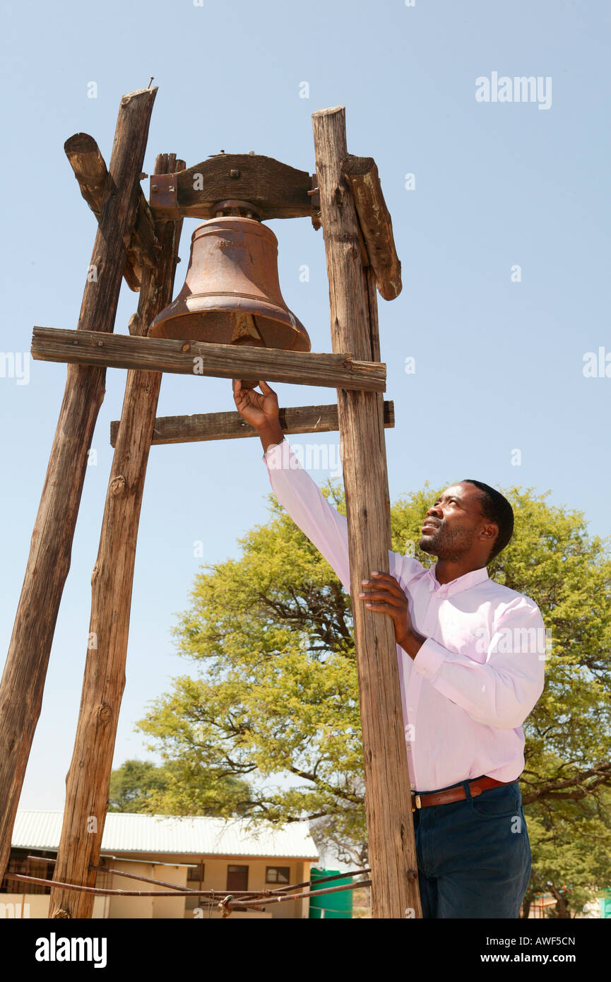 Ringing the church bell, Sehitwa, Botswana, Africa Stock Photo