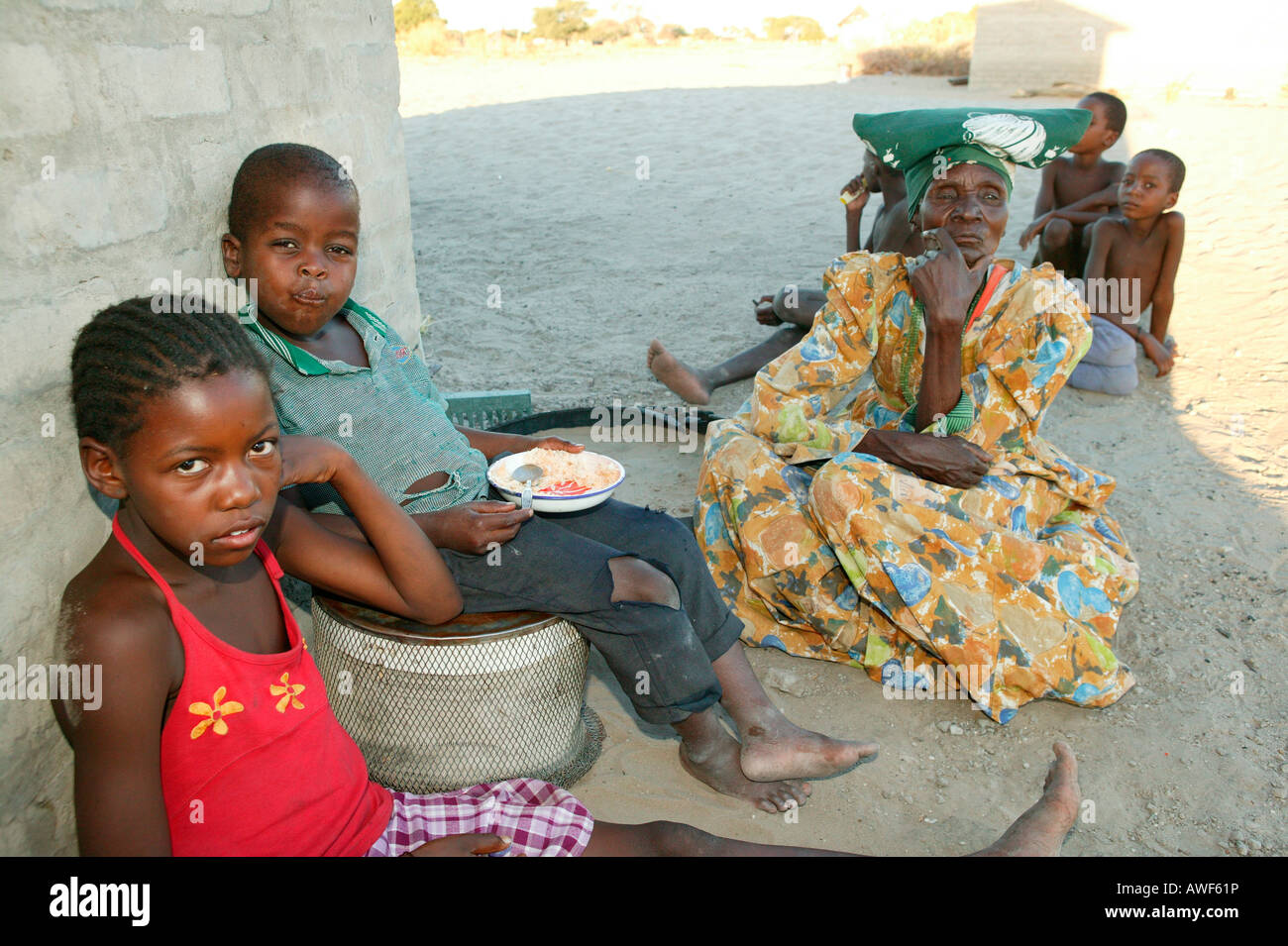 Grandmother with grandchildren, Sehitwa, Botswana, Africa Stock Photo