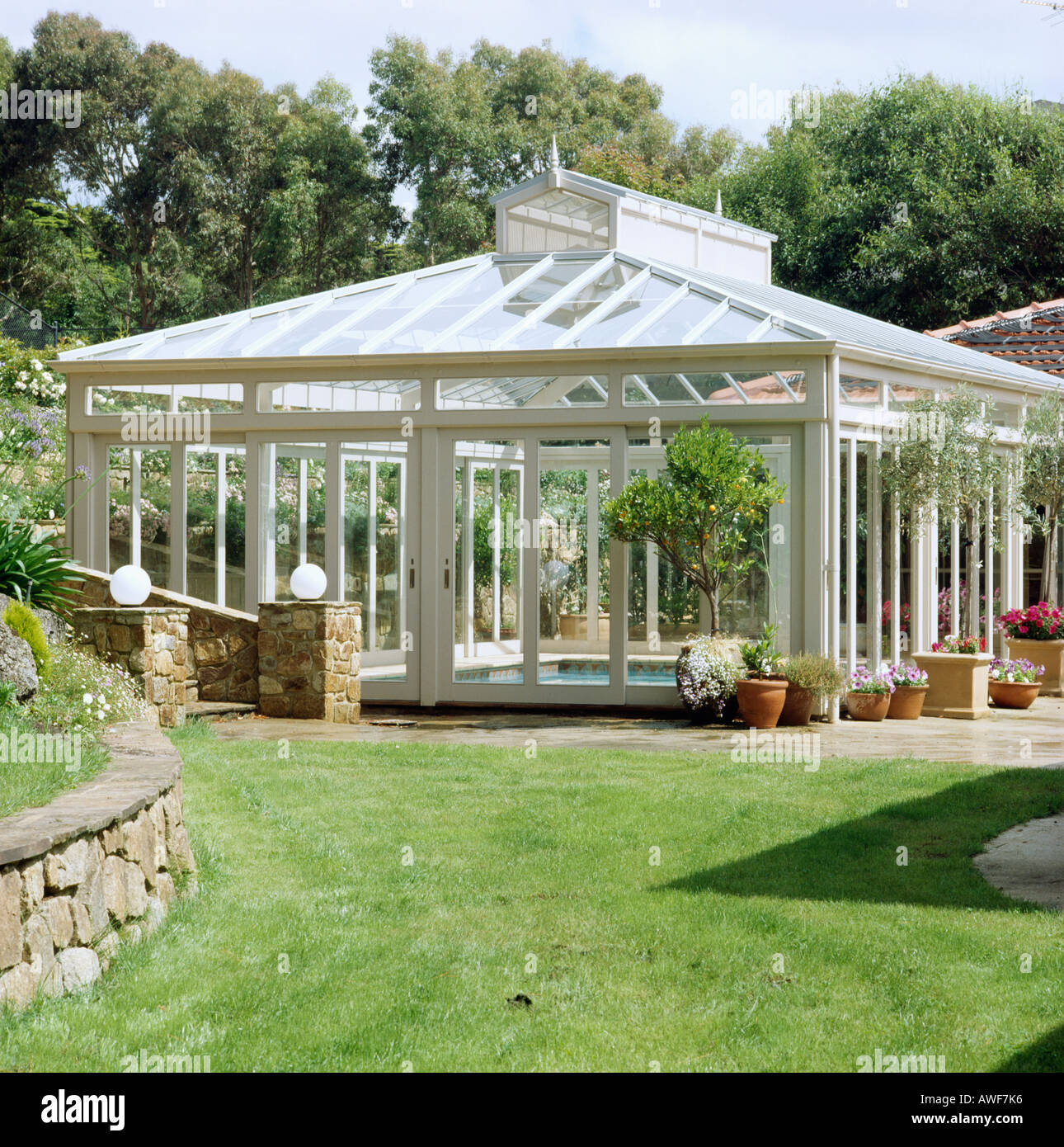 Large glass conservatory housing indoor swimming pool Stock Photo Alamy