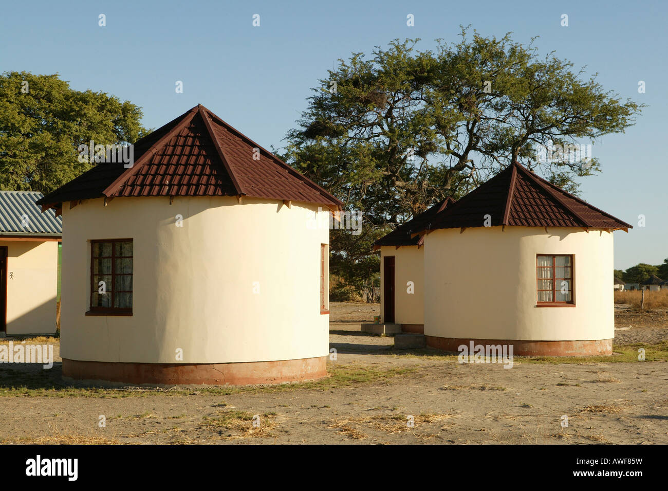 New buildings modeled after traditional roundhuts, Sehitwa, Botswana