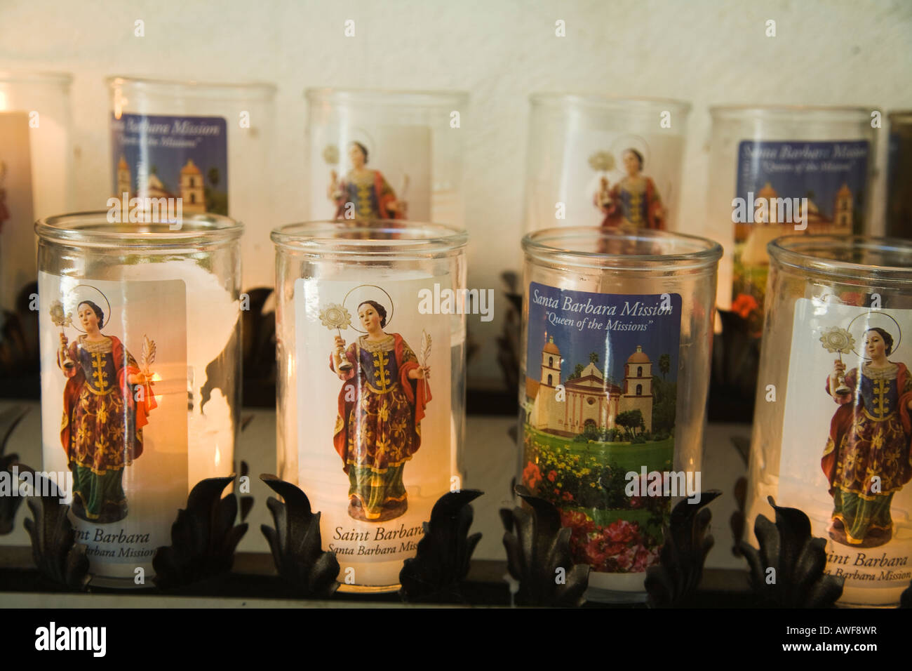 CALIFORNIA Santa Barbara Votive candles at altar Mission Santa Barbara established by Padre Junipero Serra 1786 Stock Photo