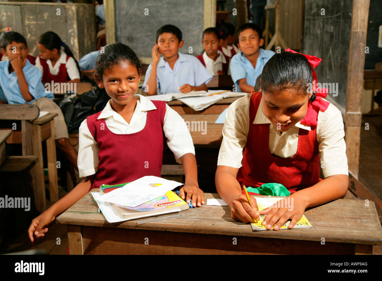Schoolchildren in uniform during class, Arawak natives, Santa Mission, Guyana, South America Stock Photo