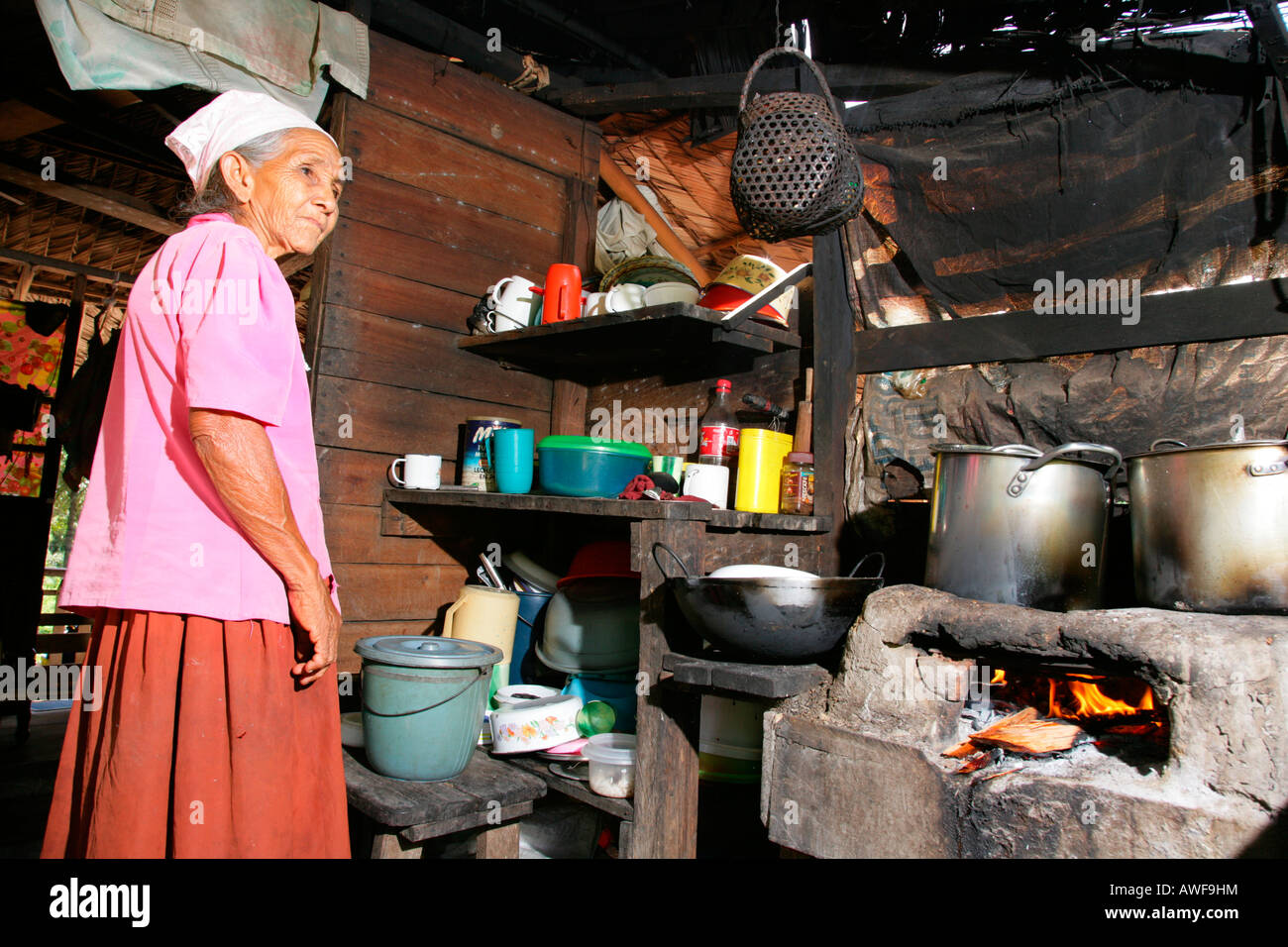 Grandmother in the kitchen, Amerindians of the Arawak tribe, Santa Mission, Guyana, South America Stock Photo