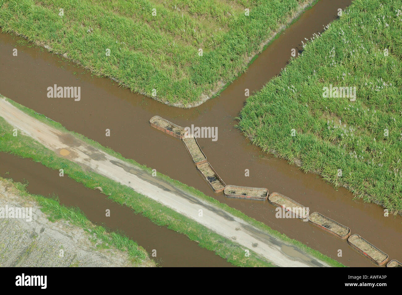 Aerial shot, barges used for the transportation of sugar cane, Demerara Province, Guyana, South America Stock Photo