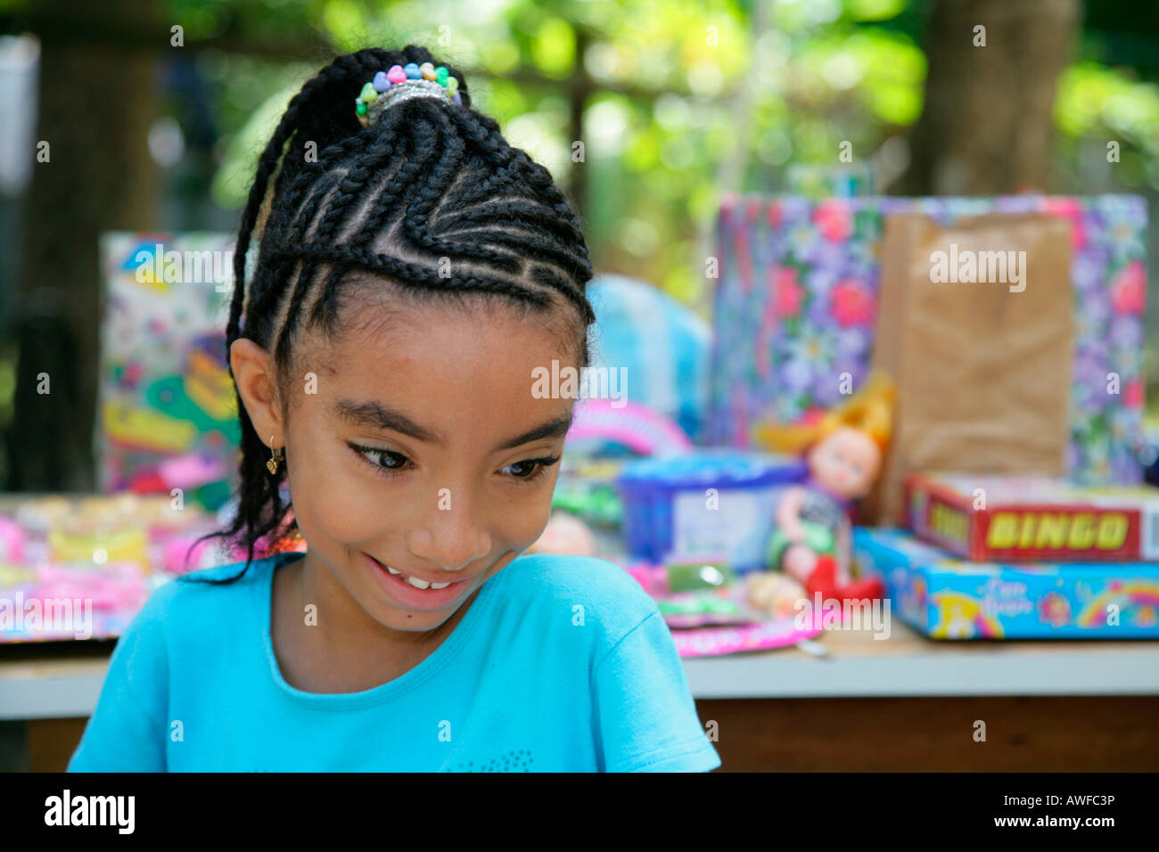 Young girl with braids in her hair, Georgetown, Guyana, South America Stock Photo