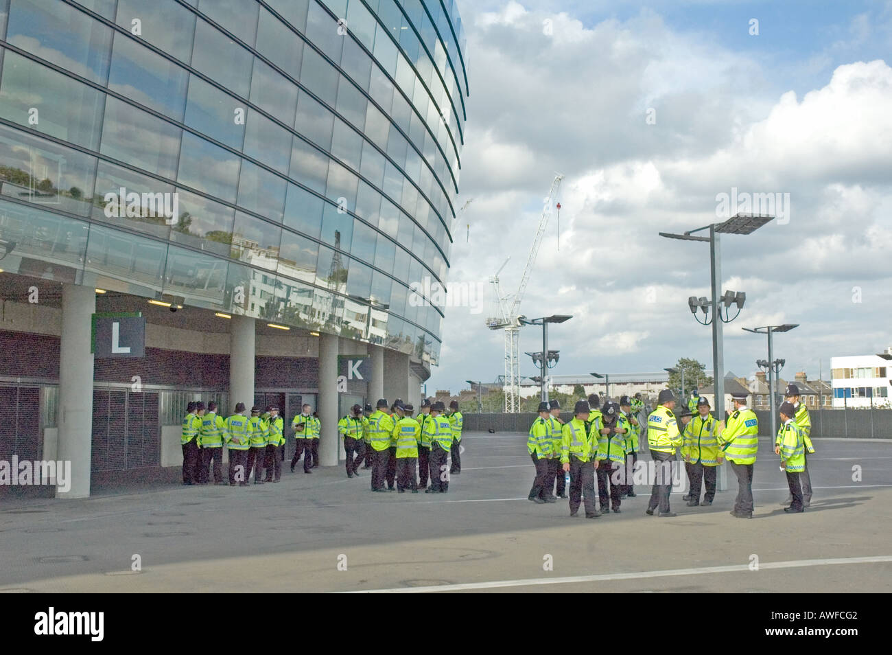 Police being briefed on the podium of Arsenal's stadium Holloway London UK Stock Photo