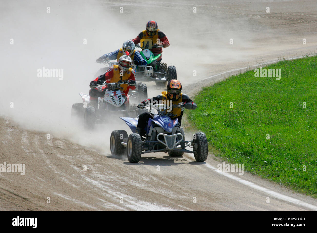 Quads, ATVs at an international motorcycle race on a dirt track speedway in Muehldorf am Inn