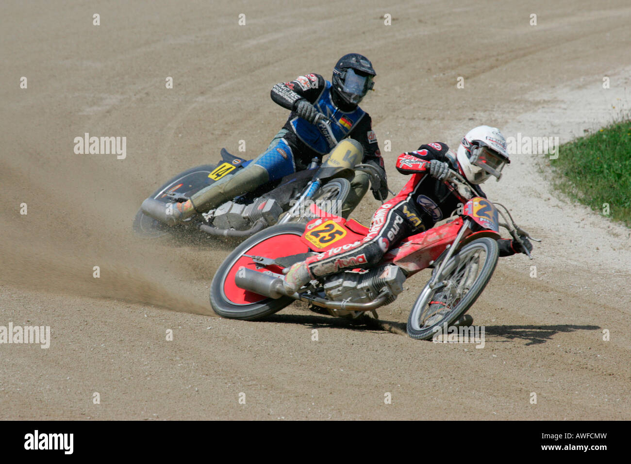 Short track race, international motorcycle race on a dirt track speedway in Muehldorf am Inn, Upper Bavaria, Bavaria, Germany,  Stock Photo