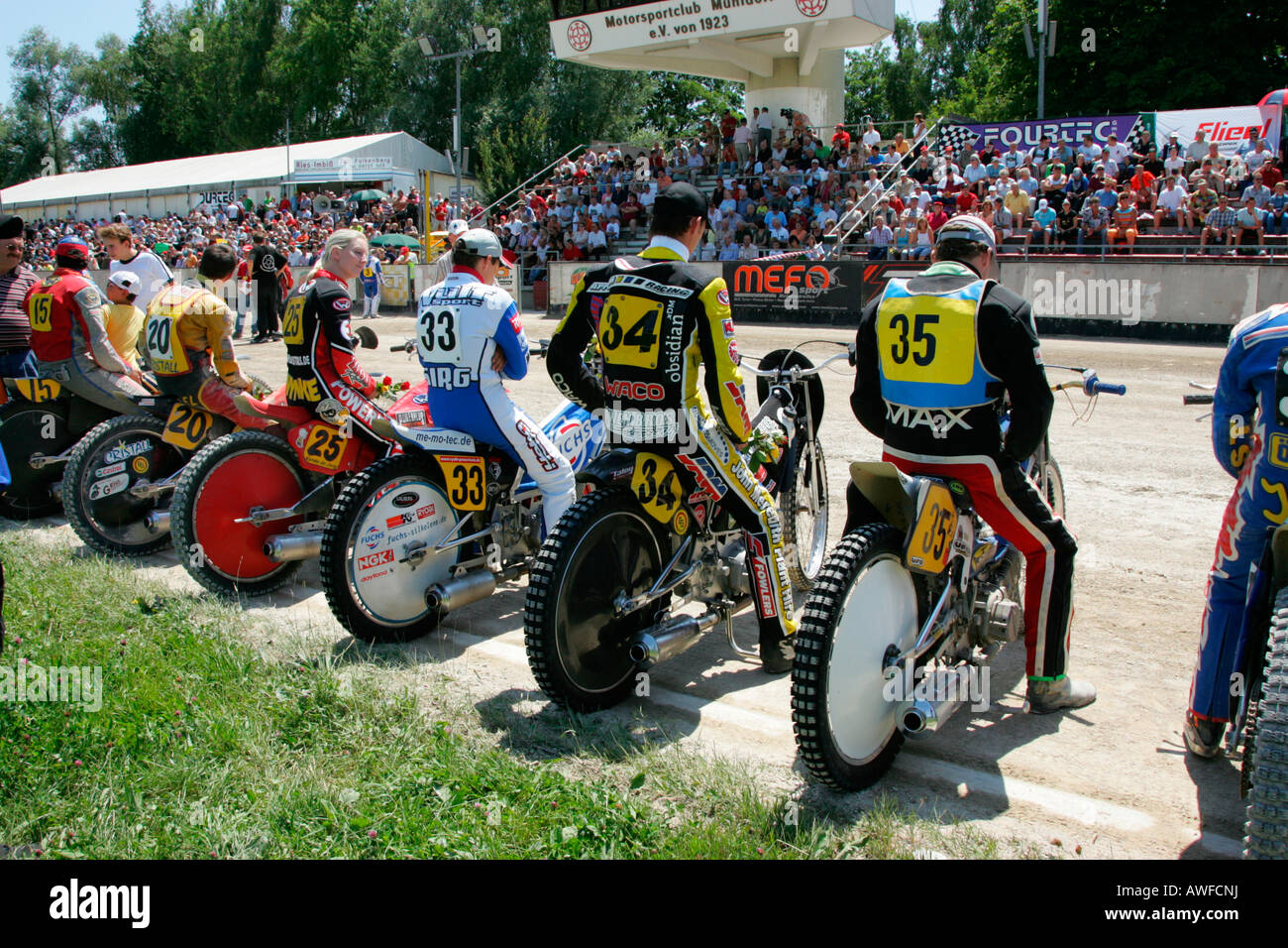 Short track race line-up, international motorcycle race on a dirt track speedway in Muehldorf am Inn, Upper Bavaria, Bavaria, G Stock Photo