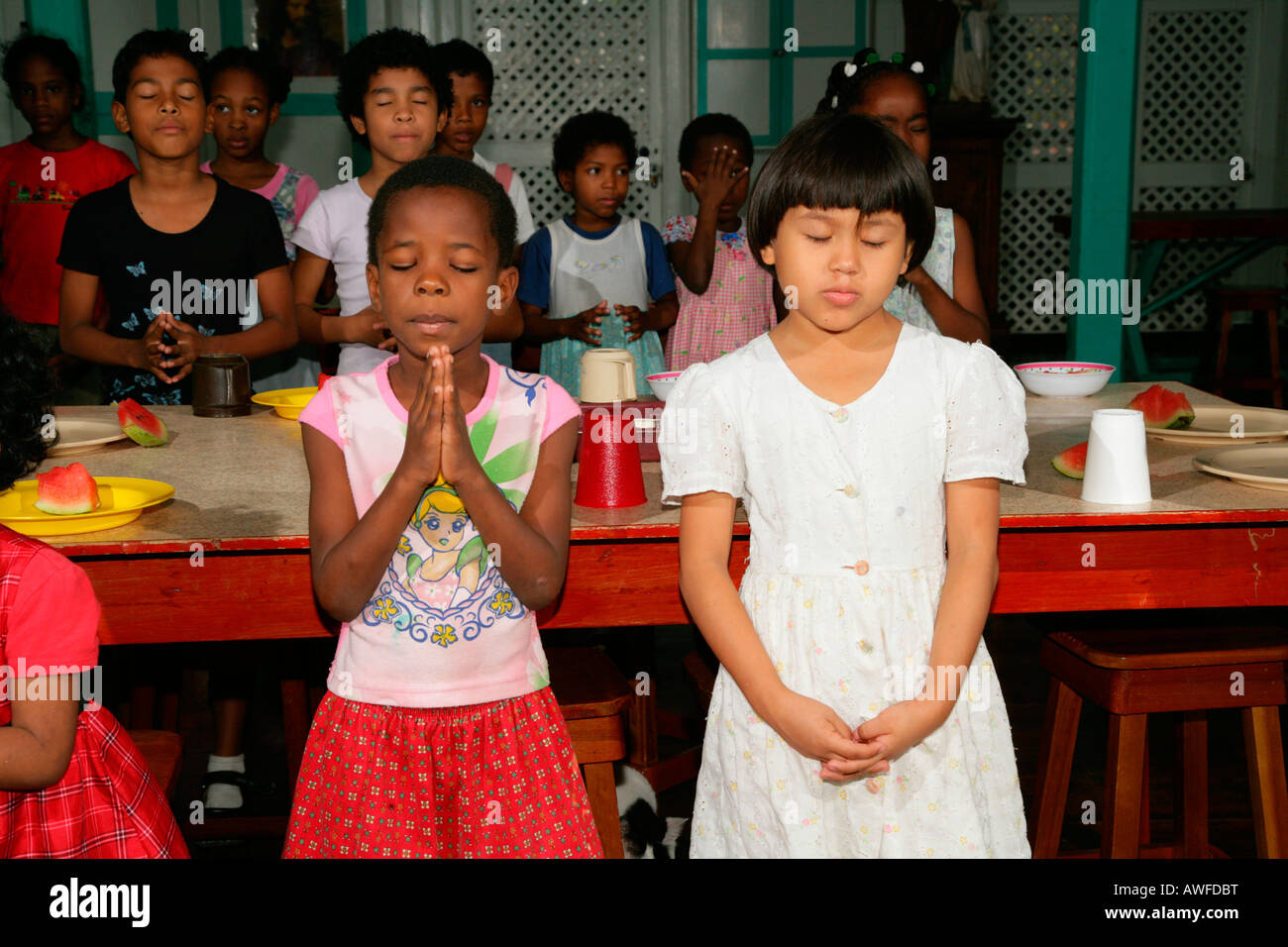 Prayers before a meal, everyday life at an Ursuline convent and orphanage, Georgetown, Guyana, South America Stock Photo
